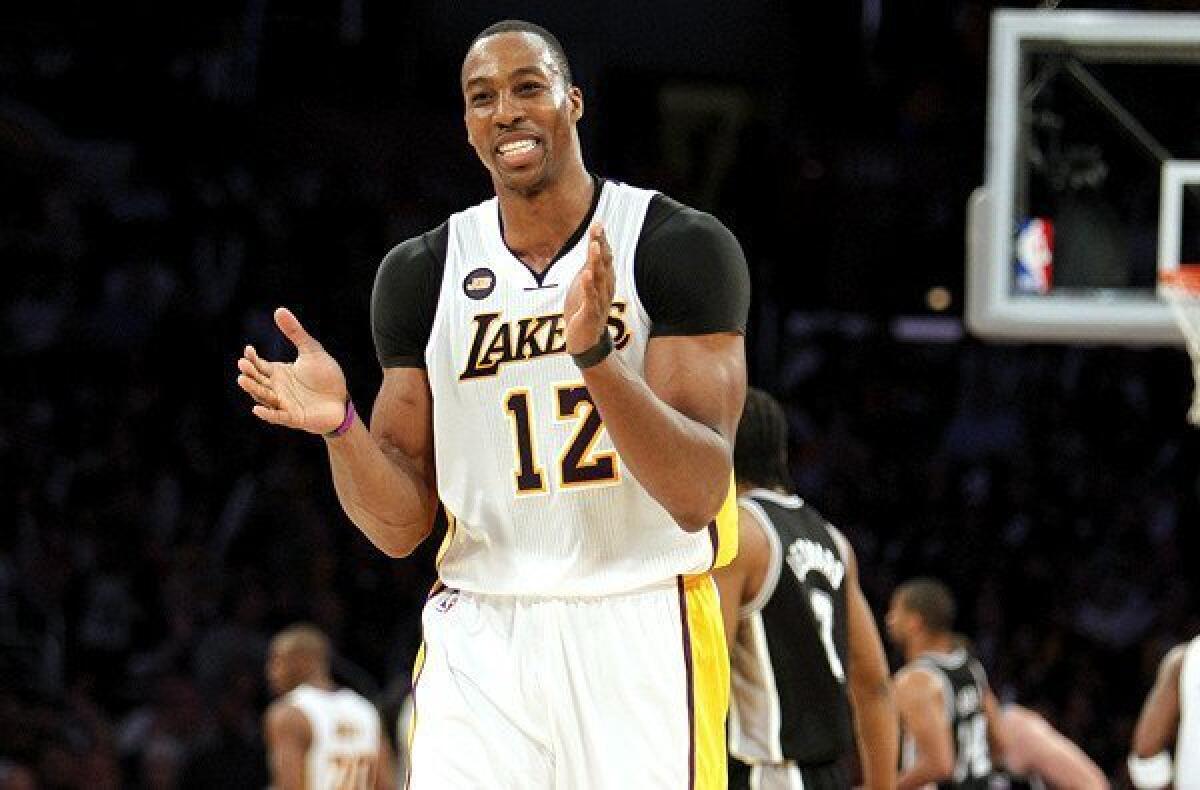 Center Dwight Howard reacts as the Lakers open a lead against the Spurs in the fourth quarter of a game earlier this season.