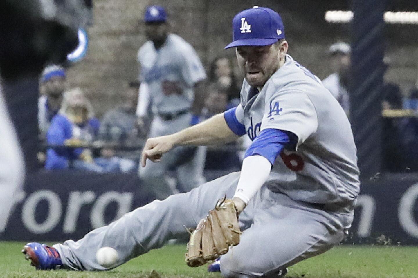 SoleCollector - New Los Angeles Dodgers shortstop Manny Machado wearing  blue Jordan 4 cleats.