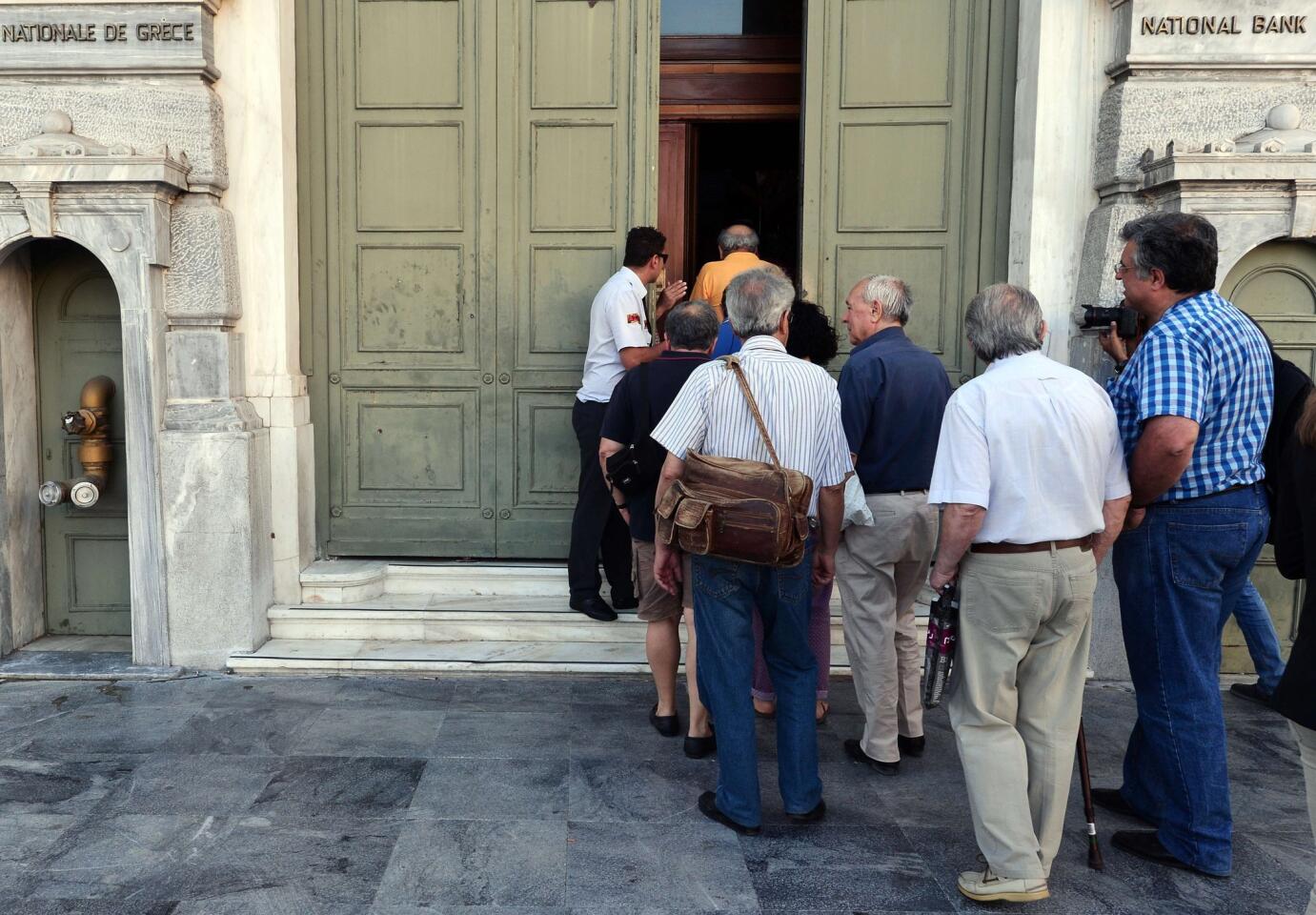 Greek banks reopen