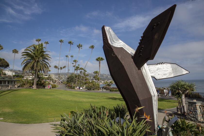 "Breaching Whale," a sculpture by Jon Seeman, is seen at Heisler Park in Laguna Beach.