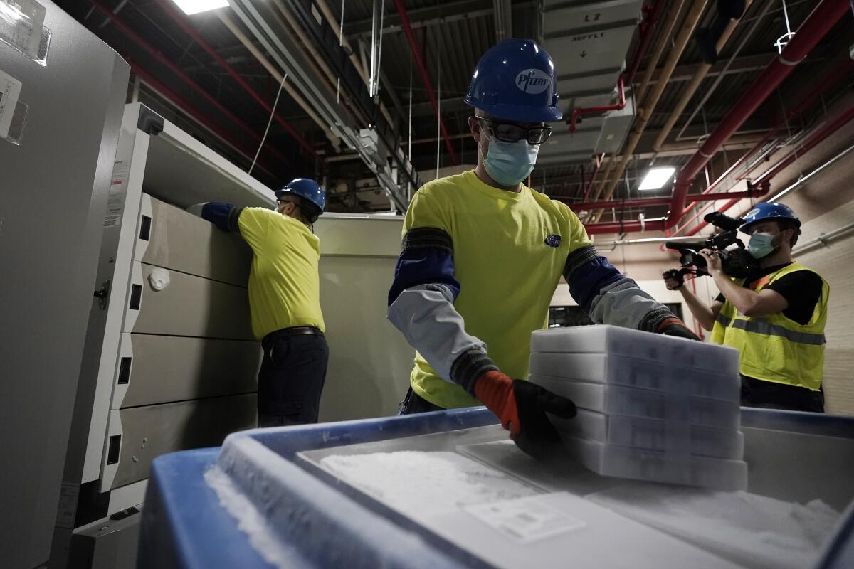 Boxes containing the Pfizer-BioNTech COVID-19 vaccine