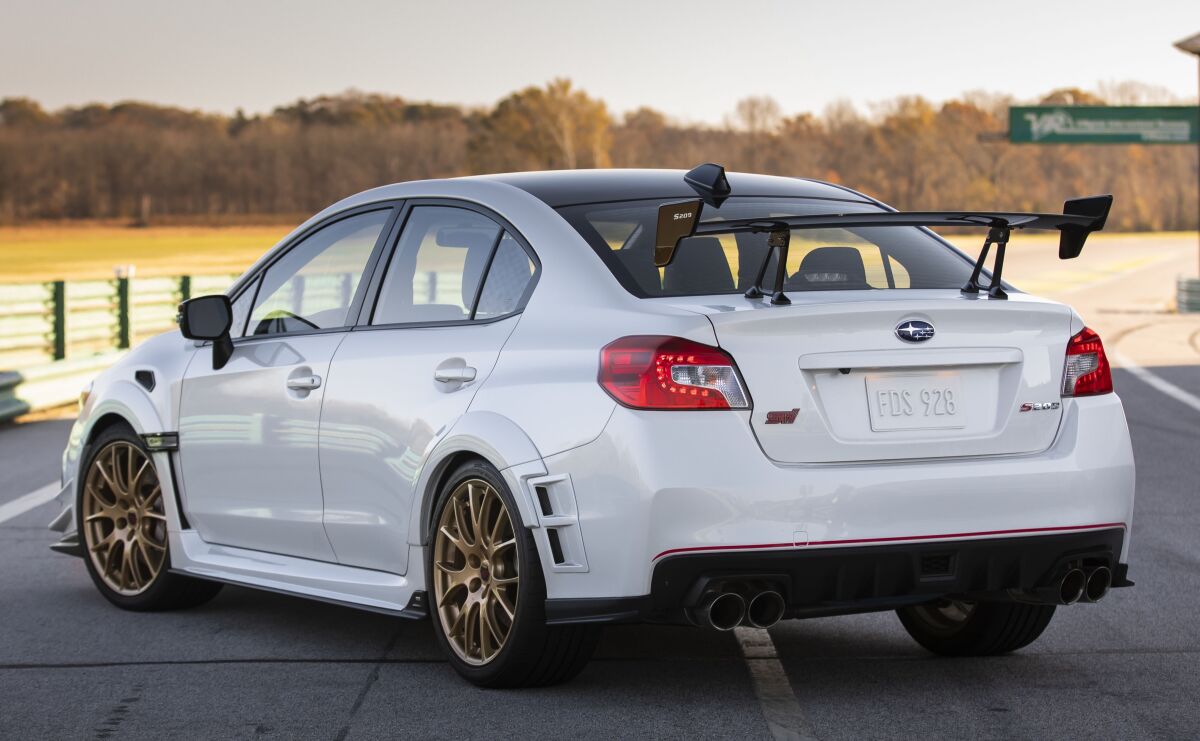 The widebody treatment stretches overall width to 72.4 inches, or 1.7 inches wider than a standard WRX STI.
