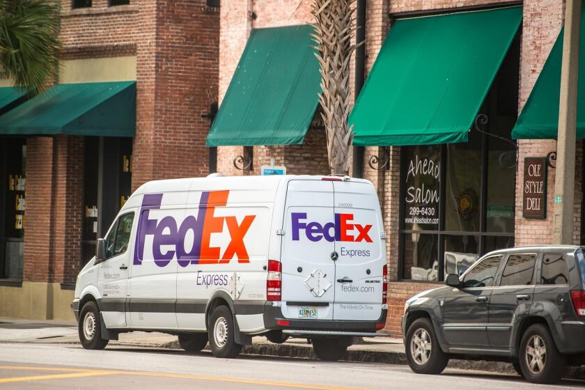 Tampa, USA - January 20, 2015: Fedex Car parked on Tampa street, Florida, USA