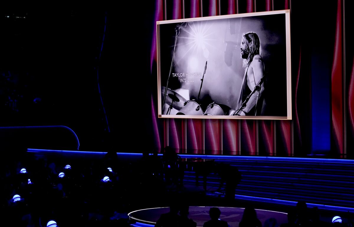 The late Taylor Hawkins appears on screen during an In Memoriam tribute at the 64th Annual Grammy Awards