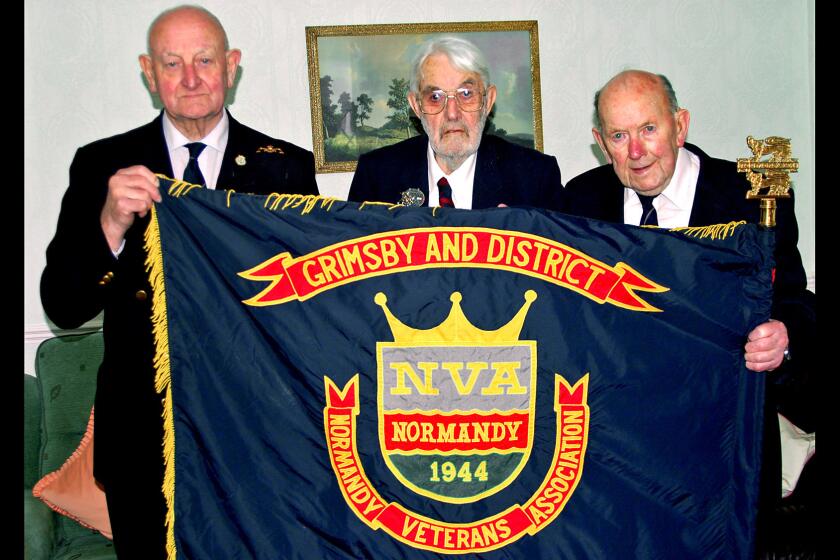 Britain's Normandy Veterans Assn. once had 15,000 members. About 600 are still living. Walter Marshall, 89, from left, Henry Draper, 93, and Eric Gower, 90, are among the five remaining in the founding chapter.