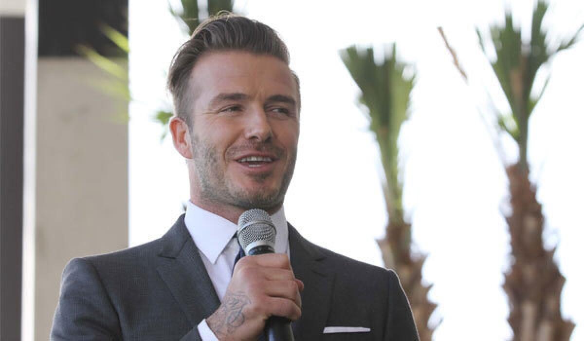 David Beckham attends a news conference at PAMM Art Museum on Feb. 5 to announce plans to launch a new Major League Soccer franchise in Miami.