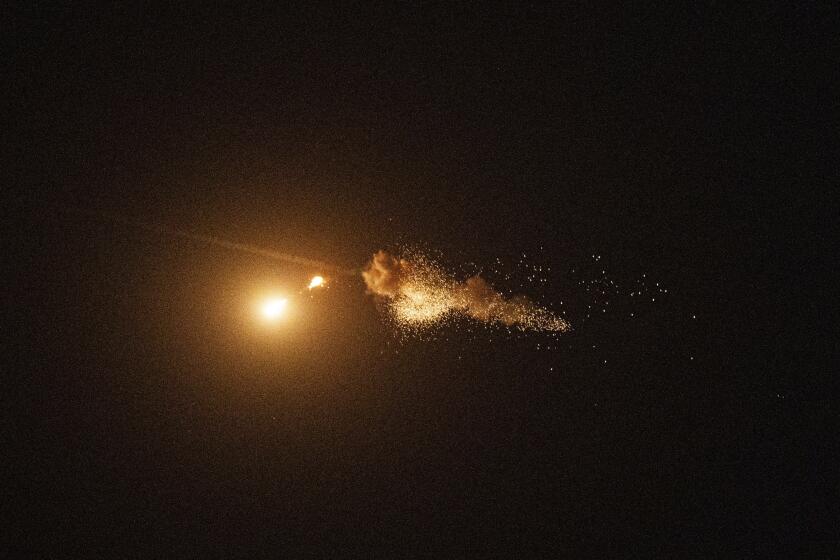 Ukrainian air defense intercepts a Shahed drone mid-air during a Russia aerial attack on the capital in Kyiv, Ukraine, Saturday, Sept. 7, 2024. (AP Photo/Evgeniy Maloletka)