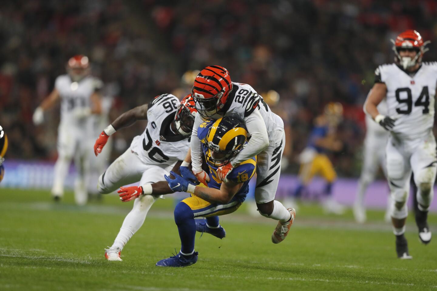 Rams wide receiver Cooper Kupp is tackled by Bengals cornerback Tony McRae (29) during the second half.
