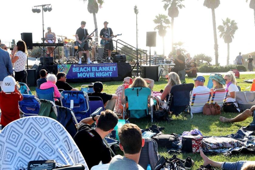 Performers and event attendees at a previous Beach Blanket Movie Night in Solana Beach.