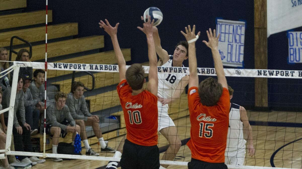 Newport Harbor High's Ethan Talley (18), shown competing on April 7, 2017, kept the boys' volleyball team undefeated on Tuesday.