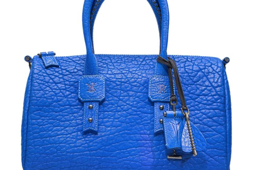 Luxury leather goods maker Parabellum pairs smooth, military-grade, high-tech ceramic hardware with deeply textured free-range American bison leather. Here, the Medicine Woman Vibrant handbag is made in one of Parabellum's signature colors.