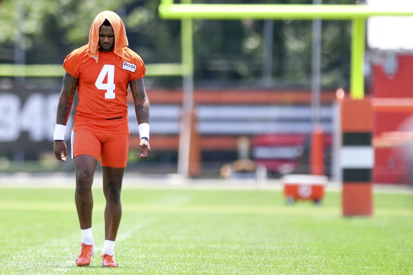 Cleveland Browns quarterback Deshawn Watson warms up before training camp on Thursday.