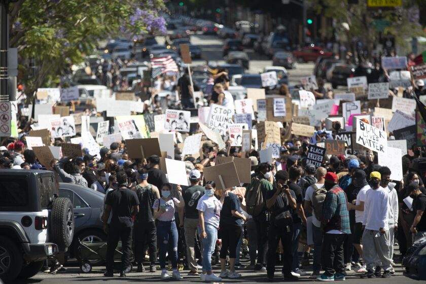 HOLLYWOOD, CA JUNE 7, 2020: Thousands of people participated in today's peaceful march peaceful march in Hollywood, CA today Sunday June 7, 2020 against police brutality sparked by the death of George Floyd. (Francine Orr/ Los Angeles Times)