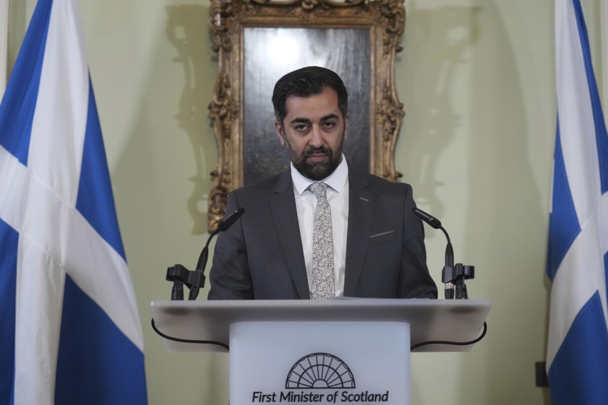 Scotland's First Minister Humza Yousaf pauses as he speaks during a press conference.