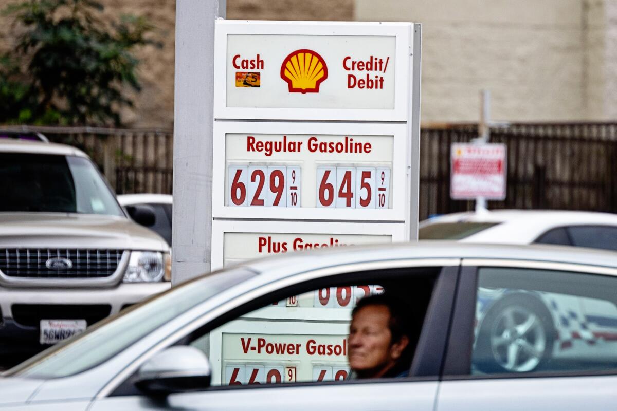 Sign shows regular gasoline at $6.45 a gallon during the September 2023 price spike.