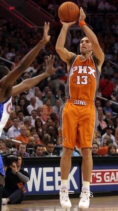Phoenix Suns guard Steve Nash shoots for three points during the first quarter.