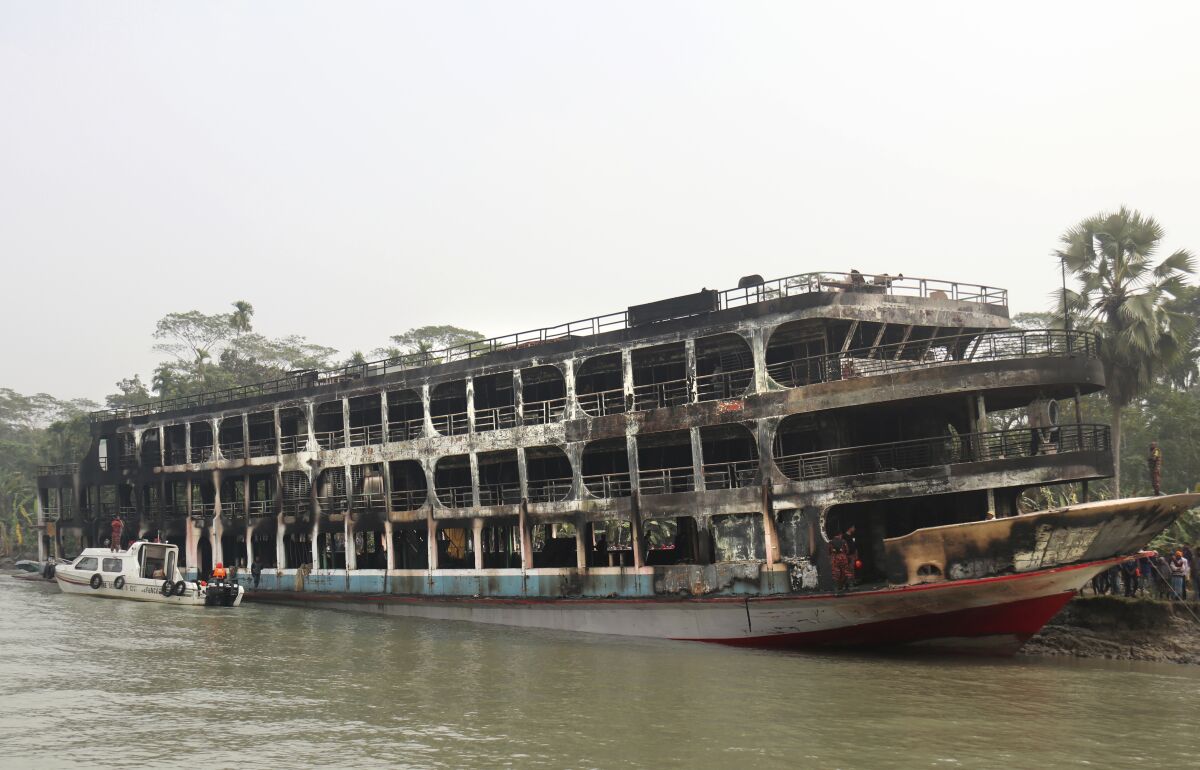 Burned-out passenger ferry