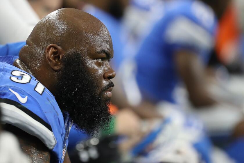 DETROIT, MI - JANUARY 01: A'Shawn Robinson #91 of the Detroit Lions sits on the bench as the final seconds tick off the clock during fourth quarter action against the Green Bay Packers at Ford Field on January 1, 2017 in Detroit, Michigan. The Packers defeated the Lions 31-24. (Photo by Leon Halip/Getty Images)
