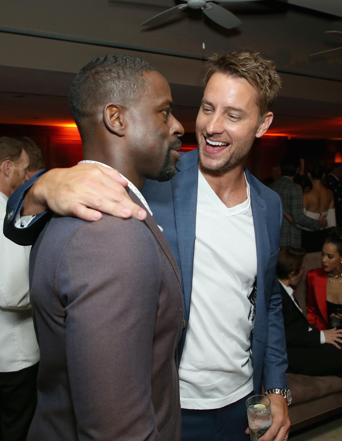 Sterling K. Brown, left, and Justin Hartley attend the 2018 Pre-Emmy Party hosted by Entertainment Weekly and L'Oreal Paris at Sunset Tower.