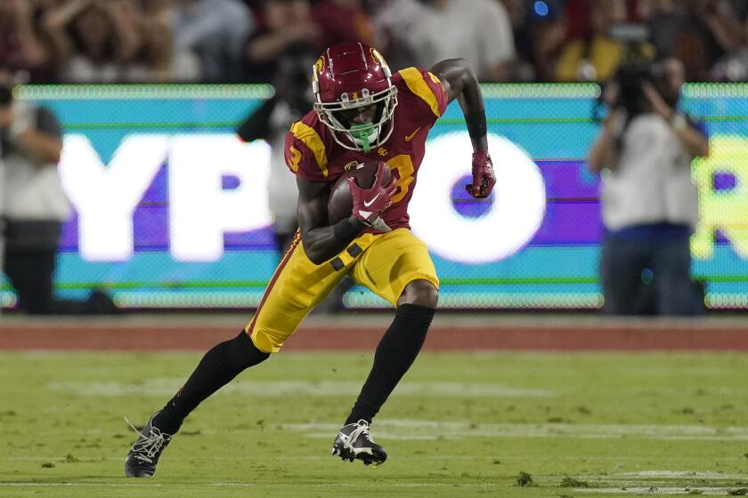 Southern California wide receiver Jordan Addison runs the ball