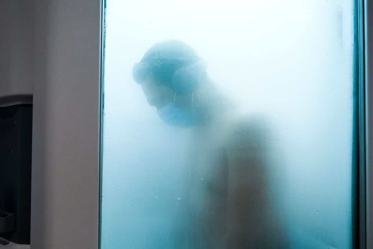 Mateo enters a cryotherapy chamber at Livkraft in La Jolla.