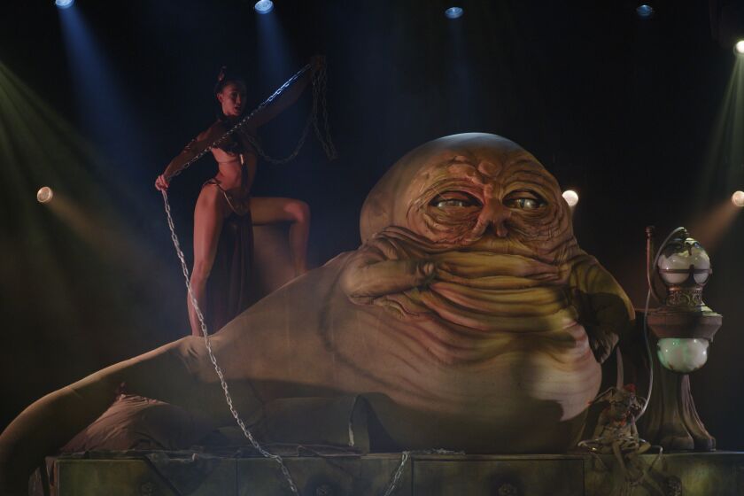 Prisoner Leia and Jabba the Hutt in "The Empire Strips Back: The Unauthorized Burlesque Parody."