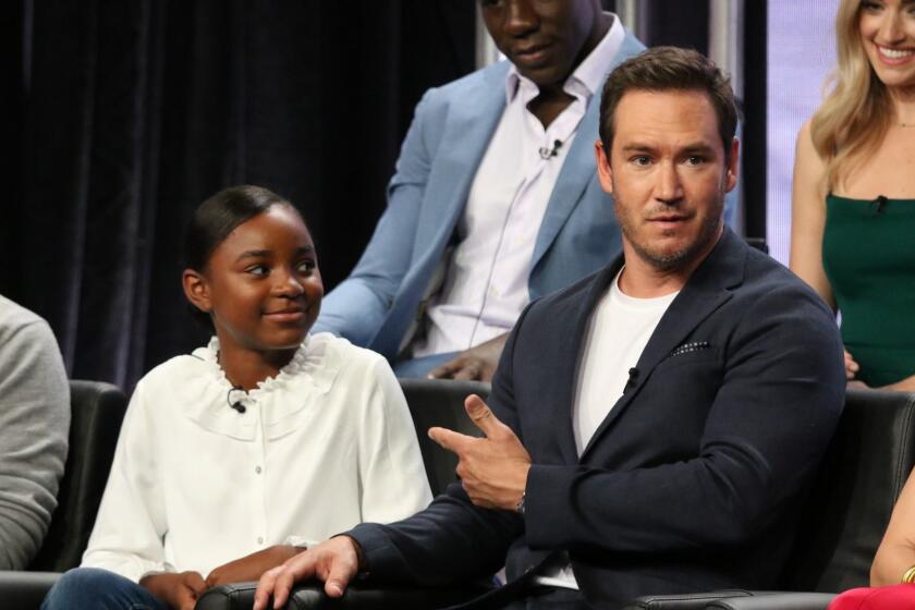 Saniyya Sidney, left, and Mark-Paul Gosselaar participate in "The Passage" panel during the Fox Television Critics Association Summer Press Tour at The Beverly Hilton hotel on Thursday, Aug. 2, 2018, in Beverly Hills, Calif. (Photo by Willy Sanjuan/Invision/AP)