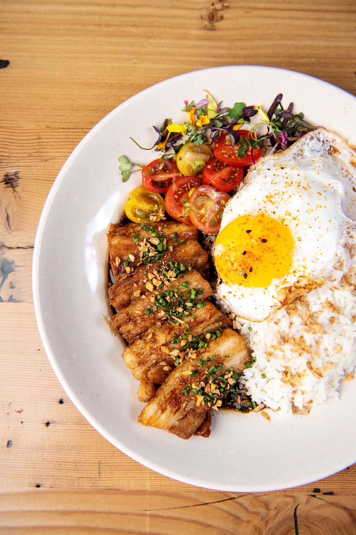 The pork belly adobo dish at Spoon & Pork