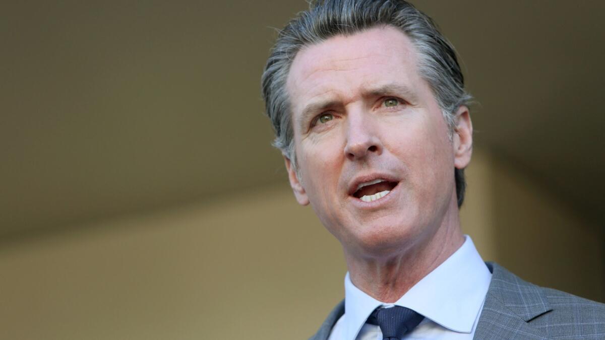 Gov. Gavin Newsom, shown at a news conference in February, on Wednesday will sign an executive order imposing a moratorium on executions in California and has vowed that no prisoner will be put to death while he is governor.