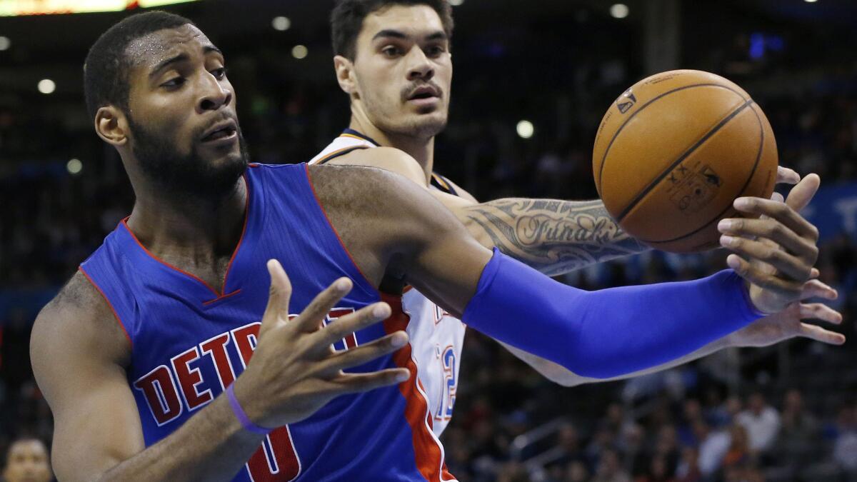 Detroit Pistons center Andre Drummond, left, battles for a rebound with Oklahoma City Thunder center Steven Adams during the Pistons' 96-89 overtime win on Nov. 14.