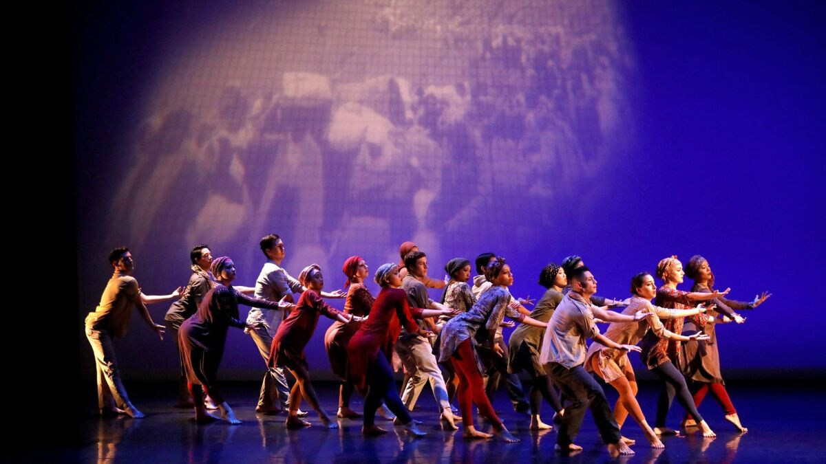 The UCI Etude Ensemble performs "Crossing the Rubicon: Passing the Point of No Return" during a tribute to the late UC Irvine dance pioneer Donald McKayle, on Wednesday at the Claire Trevor Theater