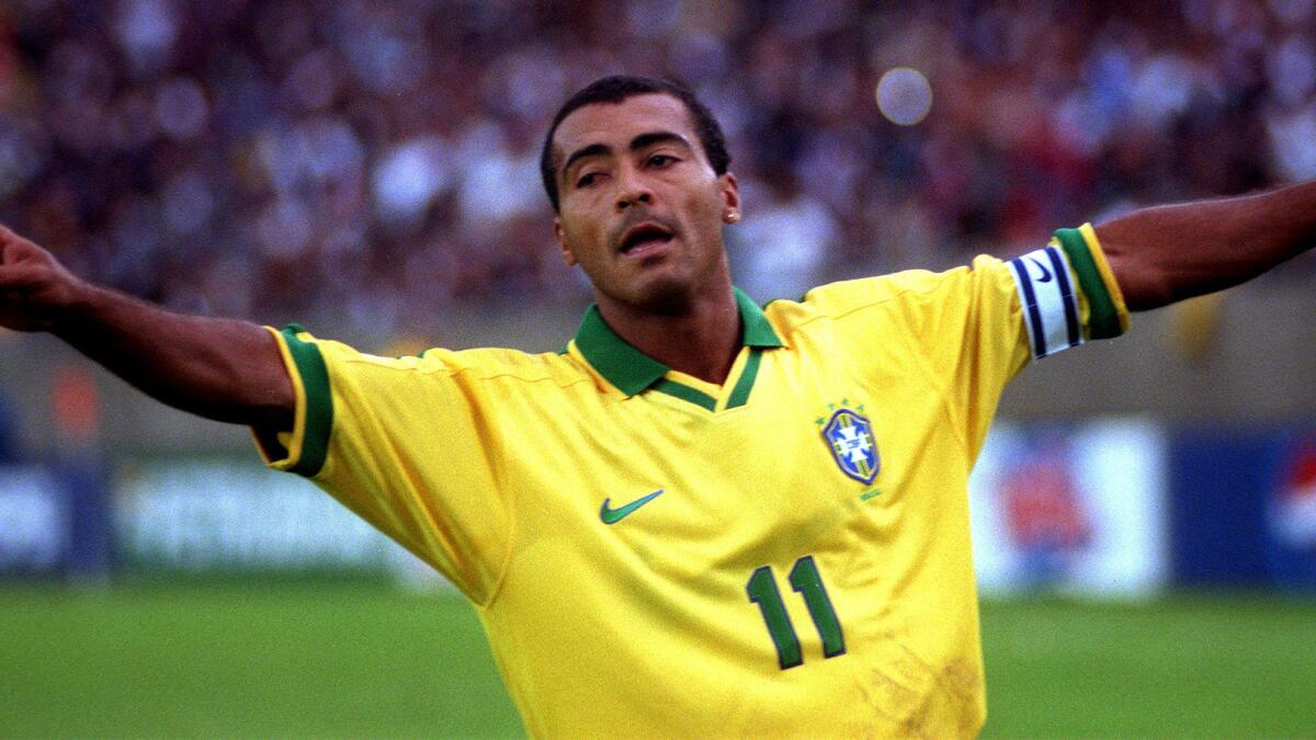 Brazil's #11 Romario de Souza gives a victory sign after scoring the first goal against El Salvador during Gold Cup 1998 held at the Los Angeles Coliseum Sunday afternoon. Photo/Art by:Genaro Molina