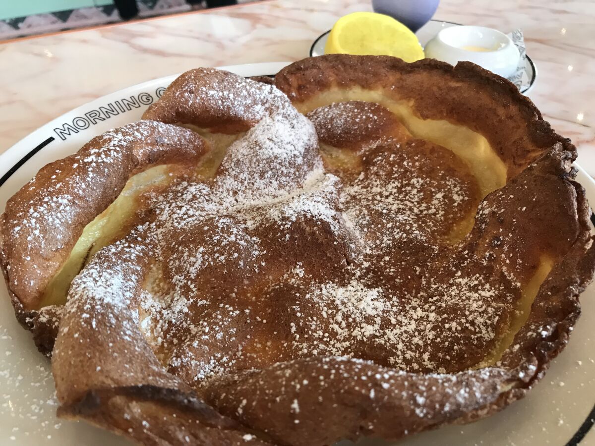 The ethereal Morning Glory German pancake. The recommended squeeze of lemon on it is everything. 