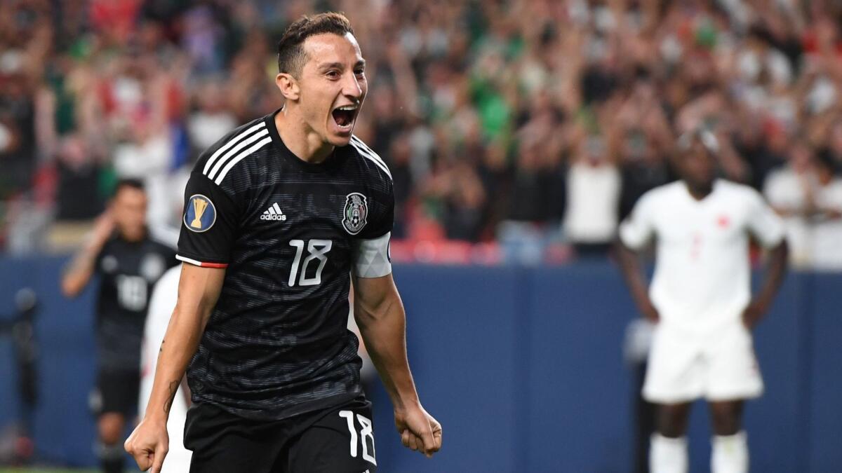 Mexico's midfielder Andres Guardado celebrates after scoring a goal during the CONCACAF Gold Cup Group A match between Mexico and Canada on Wednesday in Denver.
