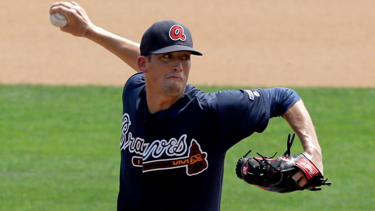 Braves reliever Dan Winkler works in the seventh inning of a game against the Ray on April 1.