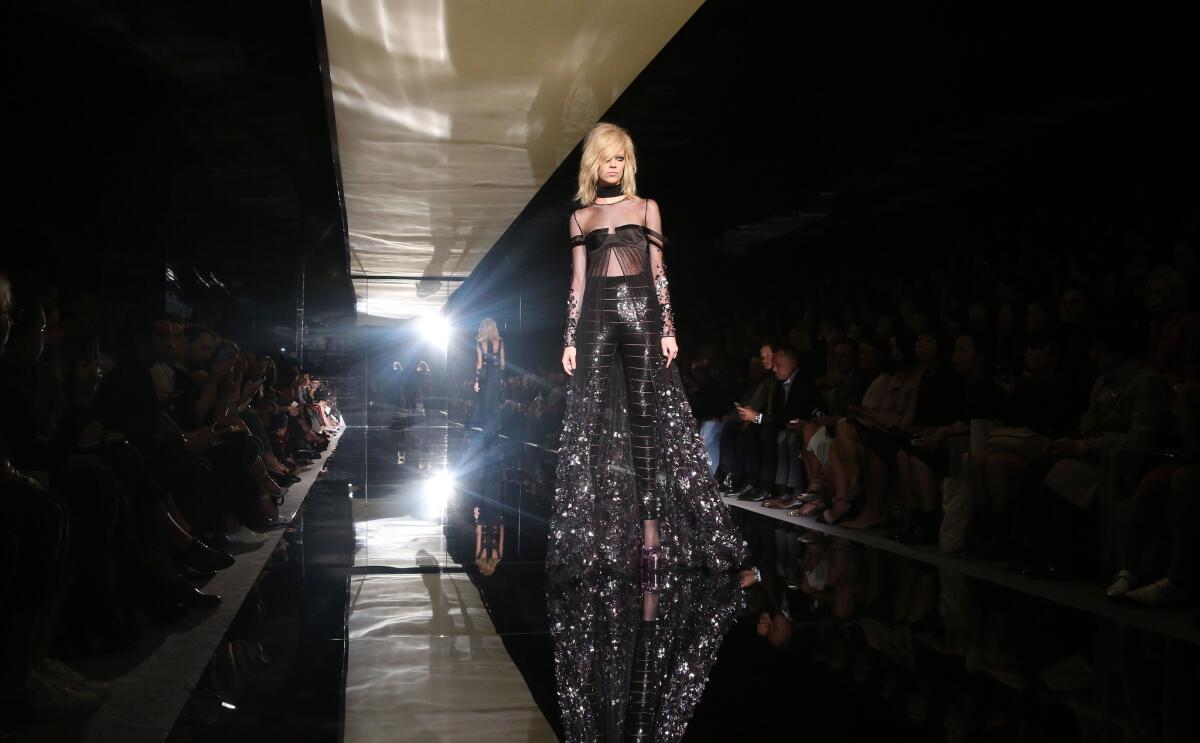 A look from Tom Ford's spring and summer 2015 runway collection shown during the most recent London Fashion Week. The designer has announced plans to debut his fall and winter 2015 womenswear collection in Los Angeles in February 2015.