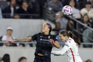 Sydney Leroux #2 of Angel City FC and Tatumn Milazzo #23 of Chicago Red Stars fight for head the ball.