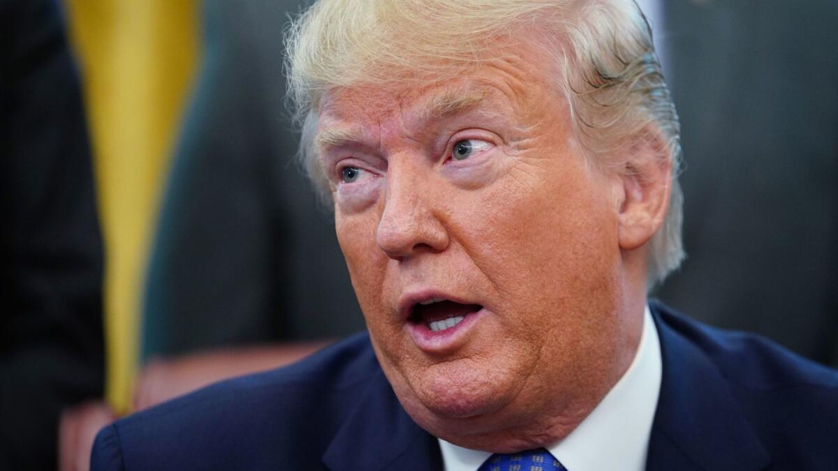 President Trump speaks before signing an executive order in the Oval Office on June 25.