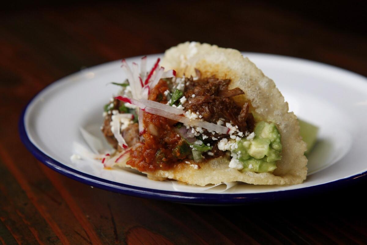 Carne guisada (stewed beef) puffy tacos from Bar Amá, a Tex-Mex restaurant downtown.