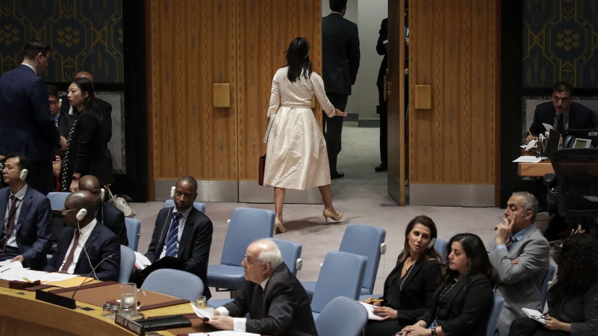 U.S. Ambassador to the United Nations Nikki Haley walks out of the chamber as Permanent Observer of Palestine to the United Nations Riyad Mansour begins to speak at a UN Security Council meeting May 15.