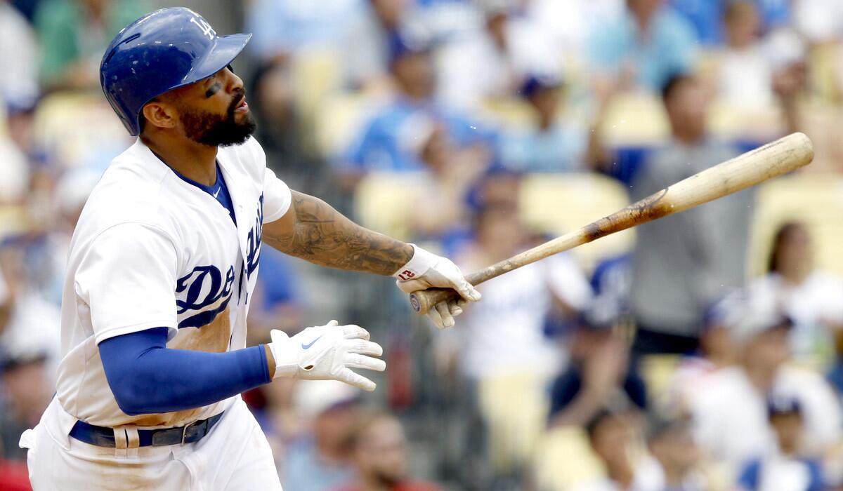 Dodgers right fielder Matt Kemp watches his solo home run in the sixth inning against the Cubs on Sunday.