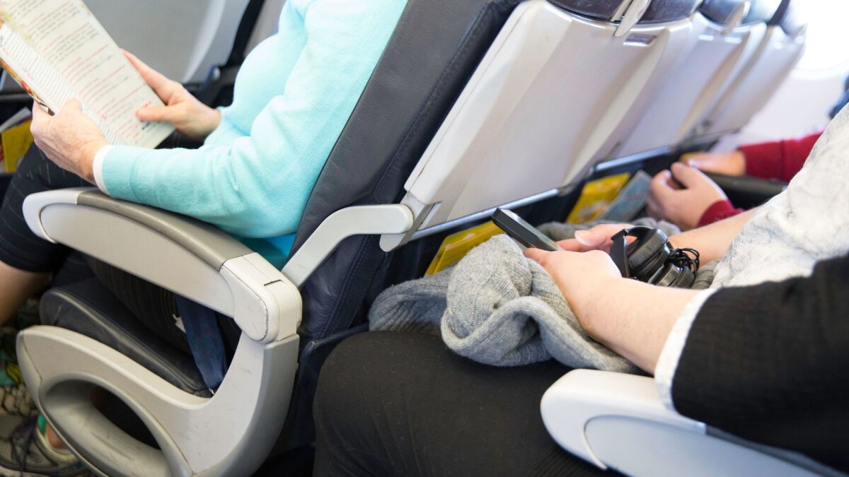 Federal lawmakers and passenger advocates are calling for airlines to stop shrinking seat widths and legroom.