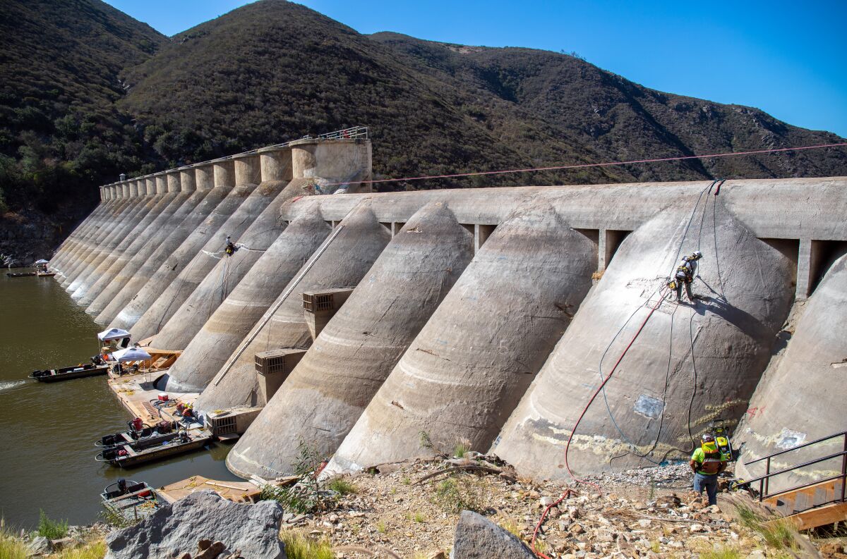 The lower water levels people might be seeing at Lake Hodges are due to the ongoing work repairing the dam.