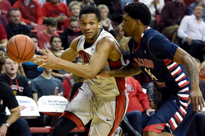 UNLV guard Rashad Vaughn drives against Fresno State guard Julien Lewis during a Mountain West Conference game on Feb. 10.
