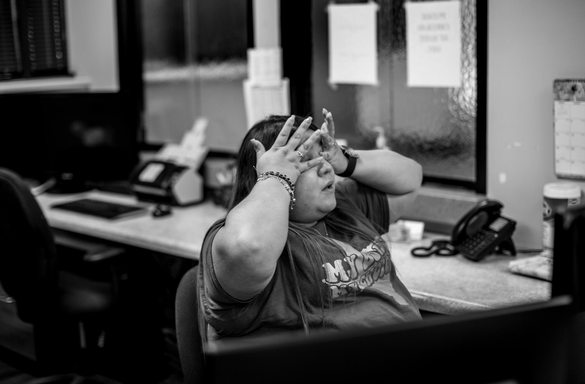 A staff member at Alamo Women’s Reproductive Services in San Antonio wipes away tears 