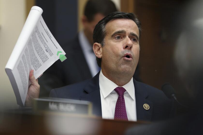 Rep. John Ratcliffe, R-Texas., asks questions to former special counsel Robert Mueller, as he testifies before the House Judiciary Committee hearing on his report on Russian election interference, on Capitol Hill, in Washington, Wednesday, July 24, 2019. (AP Photo/Andrew Harnik)