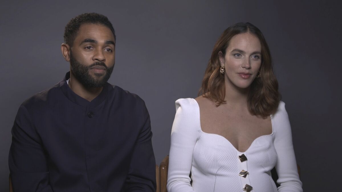 Anthony Welsh and Jessica Brown Findlay, are interviewed on Oct. 20, 2022 in London. “The Flatshare” stars Jessica Brown Findlay and Anthony Welsh got to do all their own stunts in their new rom-com TV series. (AP Photo)