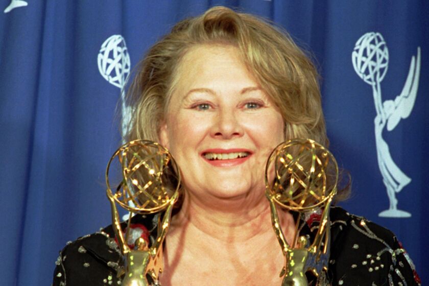 Shirley Knight holds two Emmy awards she won at the 1995 Emmy Awards at the Pasadena Civic Auditorium in Pasadena, Calif.