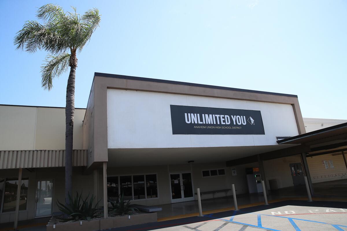 The Anaheim Union High School District headquarters and an "Unlimited You" banner in Anaheim.
