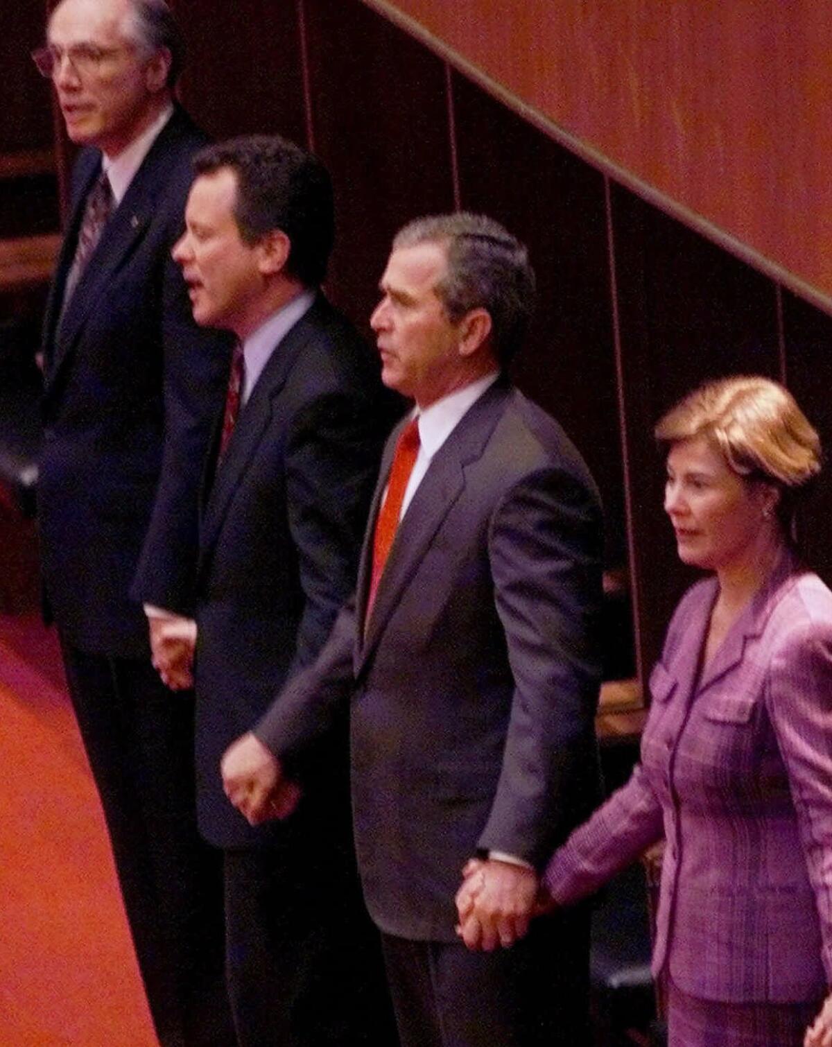 George W. Bush, right, attends an event with then-president of Bob Jones University Bob Jones III, left, and former South Carolina Gov. David Beasley in 2000 at the school in Greenville, S.C .